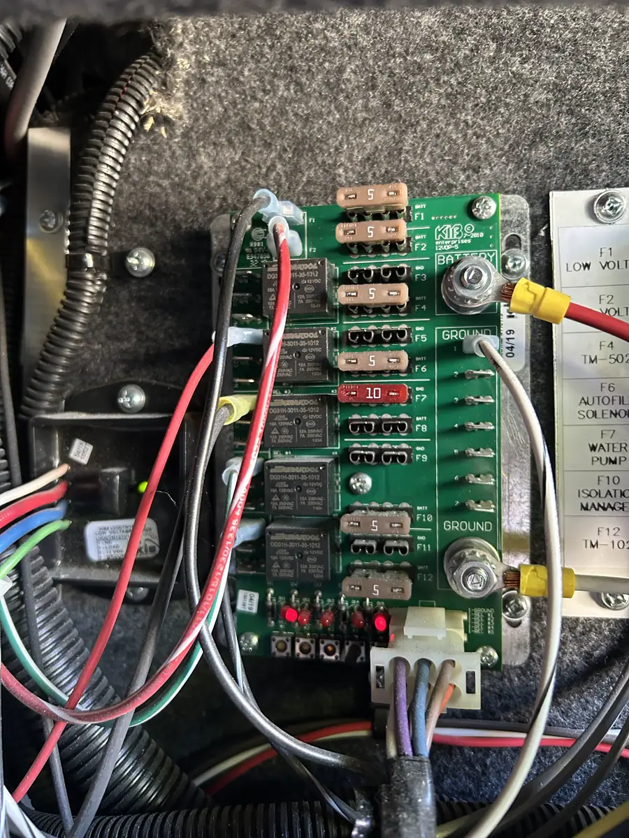 KIB Enterprises RV 12V control board with fuses, relays, and active status LEDs during diagnostics.